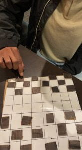 Players proceed to move pieces as thought it were normal checkers